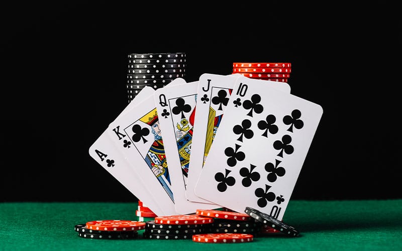 royal flush cards and casino chips