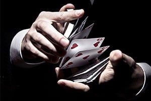 live casino dealer shuffling cards